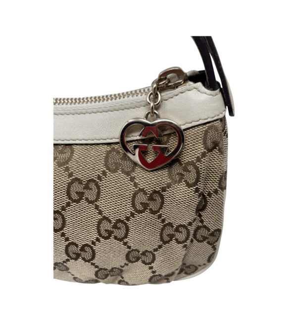 Pochette firmata Gucci in tessuto logato