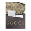 Pochette firmata Gucci in tessuto logato